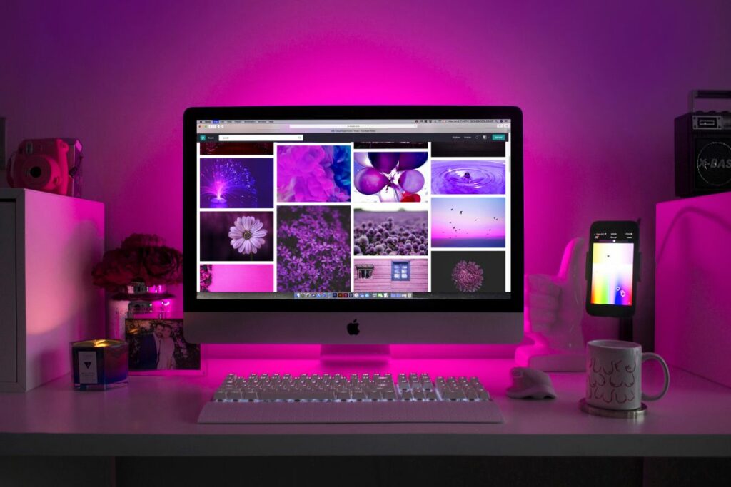Qué es efectivo en tu sitio web, computadora iMac con una galería de fotos